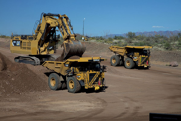 Missouri S&T alumni helped launch autonomous mining vehicles such as these. Photo provided by Caterpillar.