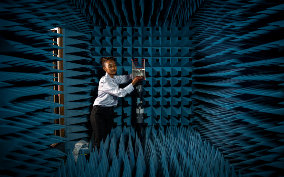 S&T student Kalkidan Anjajo, of Addis Ababa, Ethiopia, sets up a horn antenna to make antenna pattern measurements in an anechoic chamber. 