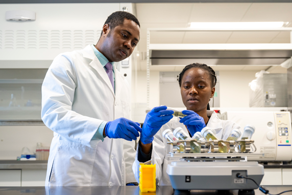 Margaret Taiwo with Dr. Michael Eze. 