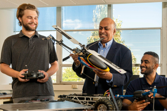 Dr. Jagannathan Sarangapani discusses an unmanned aerial vehicle with doctoral students