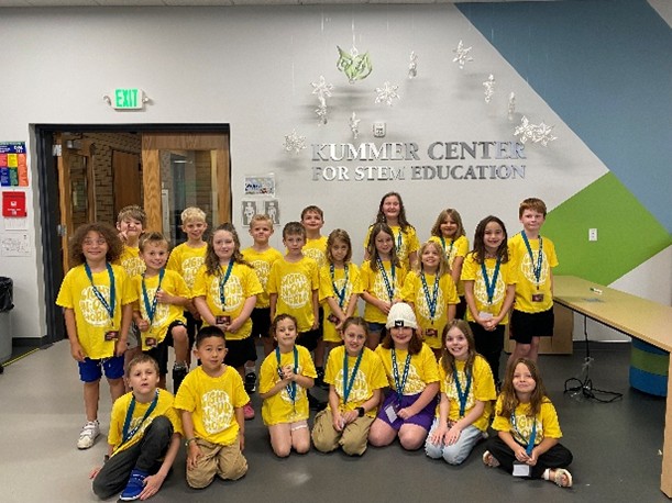 Summer camp group shot of young students.