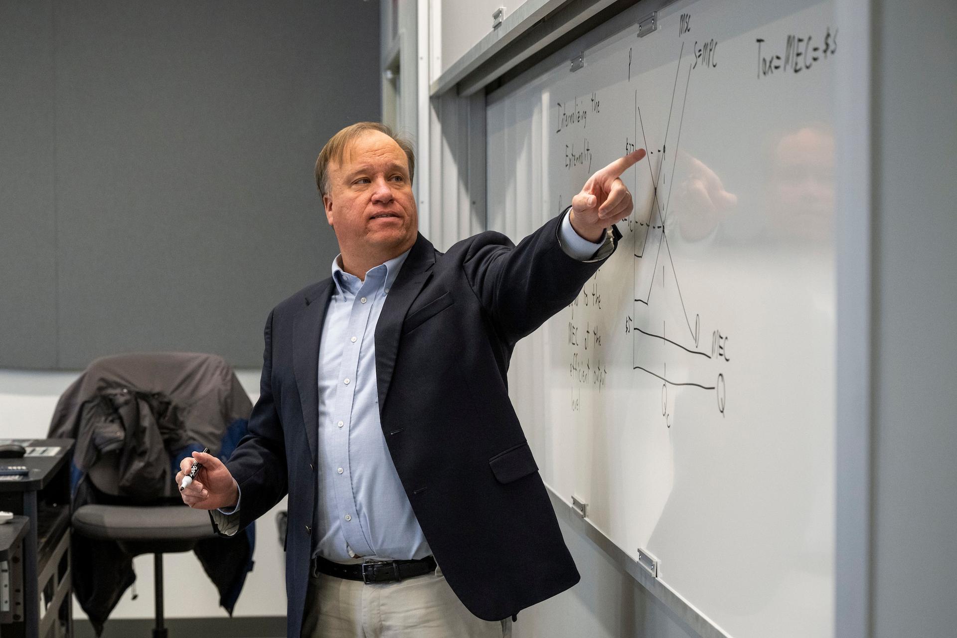 Dr. Michael Davis teaches an economics class at Missouri S&T.