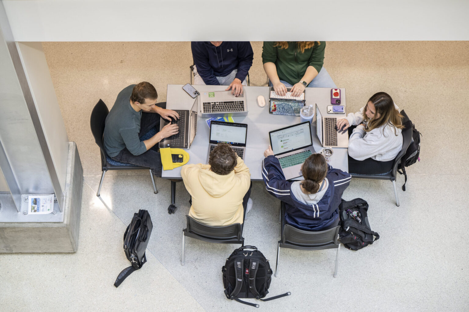 Engineering Management students meet in the atrium of Butler-Carlton Civil Engineering Hall to discuss their senior design project on Feb. 7, 2023. Photo by Michael Pierce/Missouri S&T.