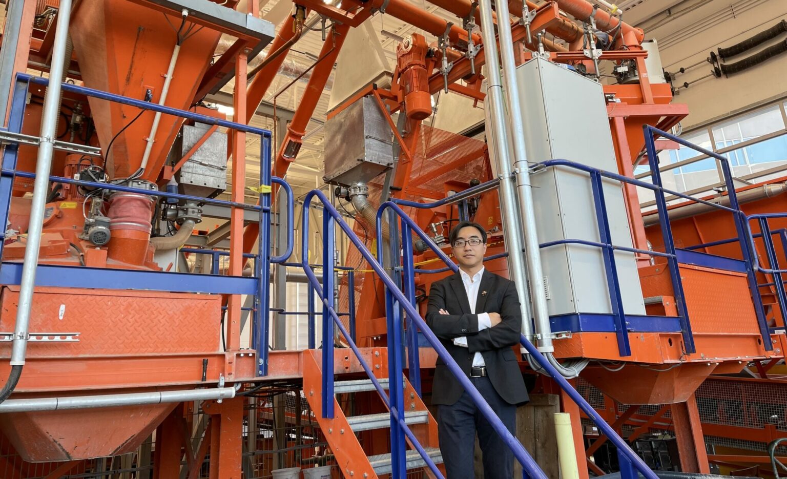 Dr. Hongyan Ma will use Missouri S&T’s semi-industrial scale concrete batching plant for demonstrating carbon-negative materials and processes for concrete production. Photo by Haodao Li/Missouri S&T.