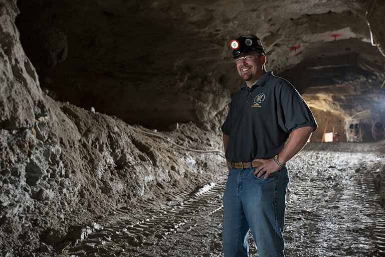 Braden Lusk standing in the experimental mine