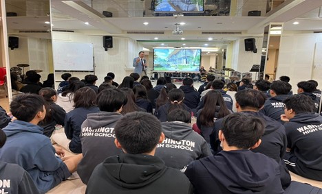 CASE dean presenting to a class of students. 